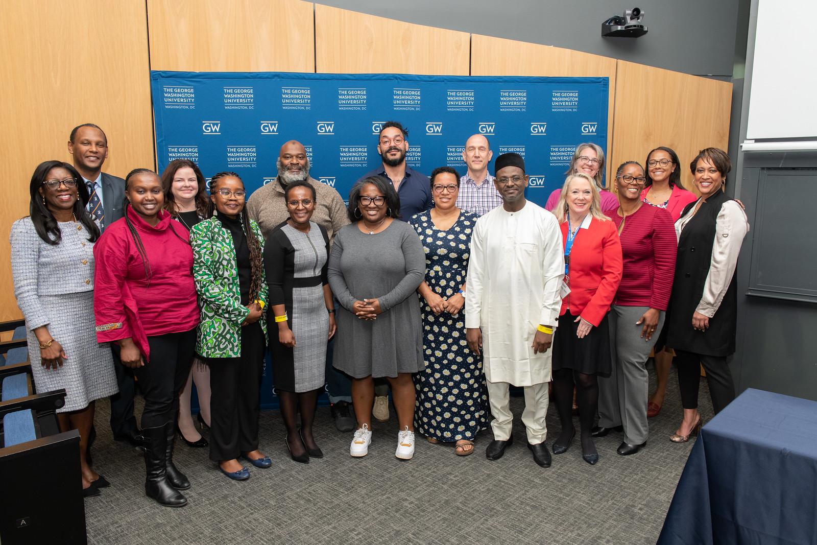 Researchers and presenters posing for a group photo