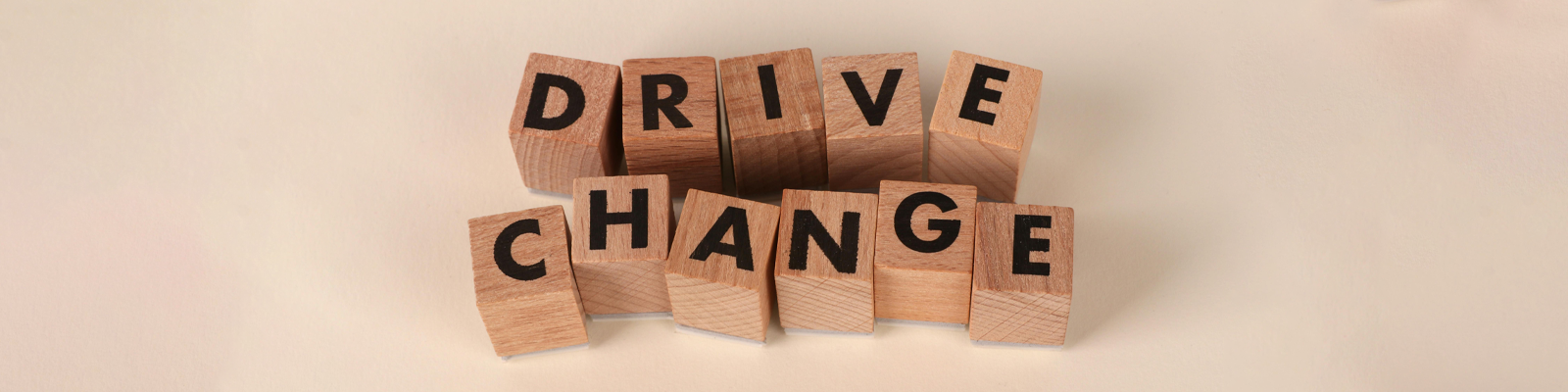 Blocks arranged to spell Drive Change